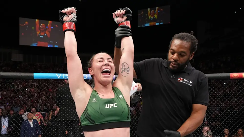 Molly McCann UFC hands raised