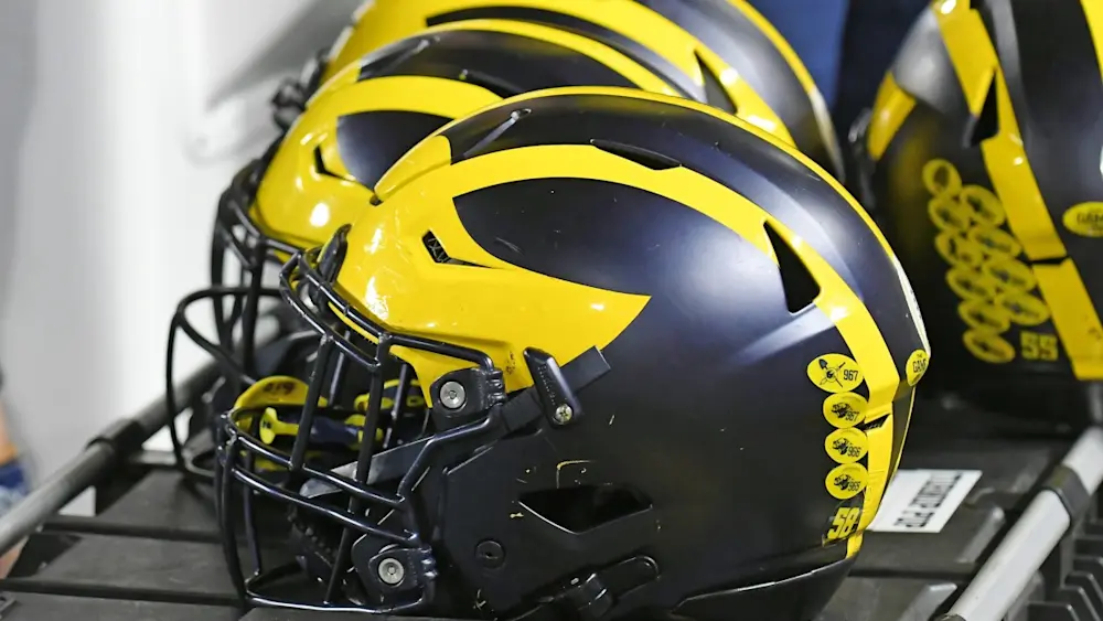 Michigan Football Helmets in Group