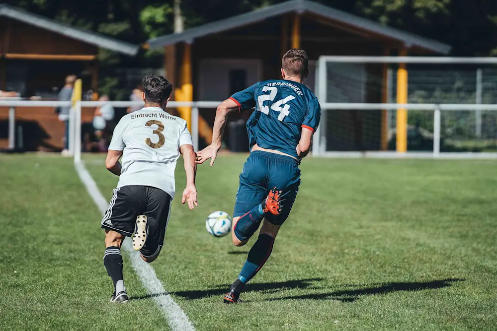 Men playing soccer