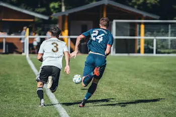 Men playing soccer