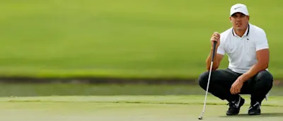 r-golf-brooks-koepka-021019.jpg