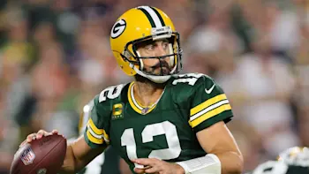 Aaron Rodgers throwing