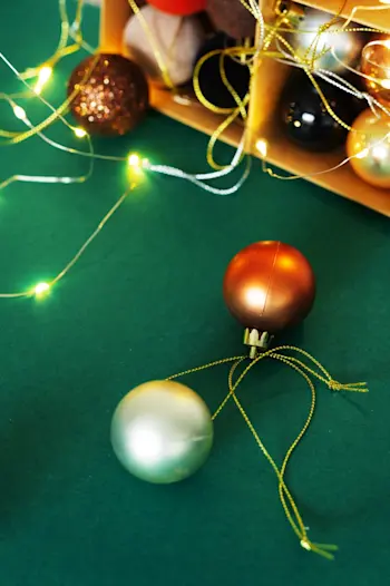 Christmas ornaments on a poker table
