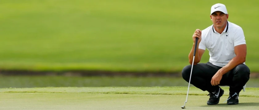 r-golf-brooks-koepka-021019.jpg