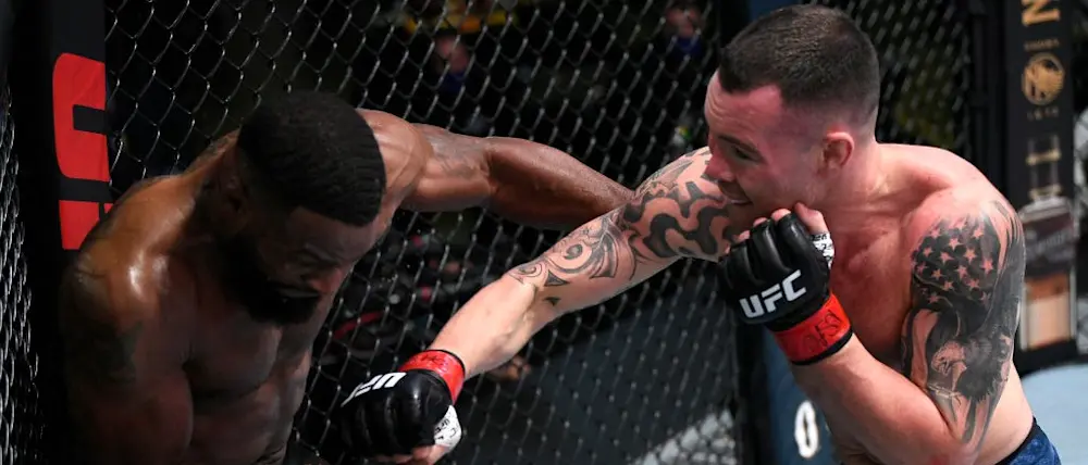 r-ufc-covington-woodley-cross.jpg