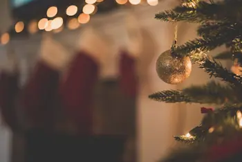 Best Christmas casino bonuses; a warm Christmas image of tree and stockings