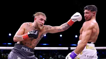 Jake Paul punching Tommy Fury